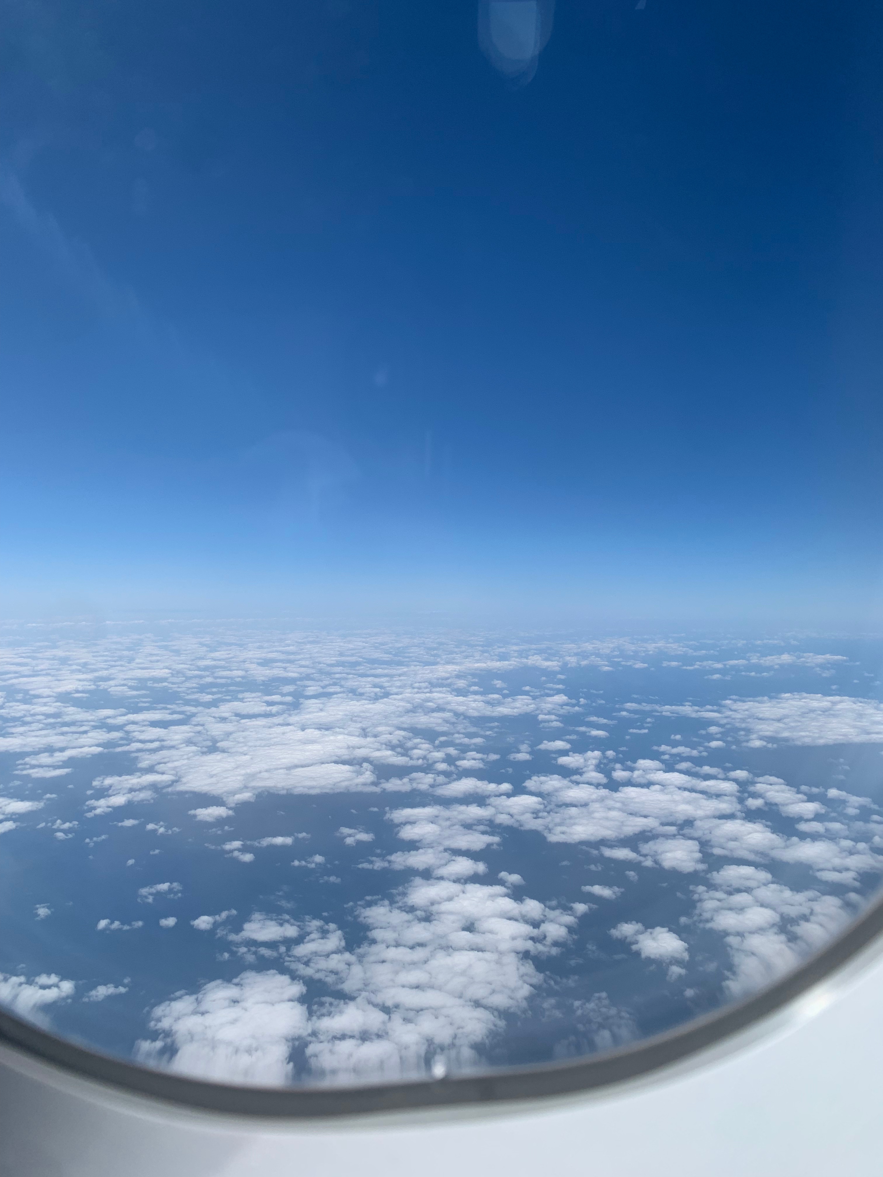 Above the clouds from the airplane window